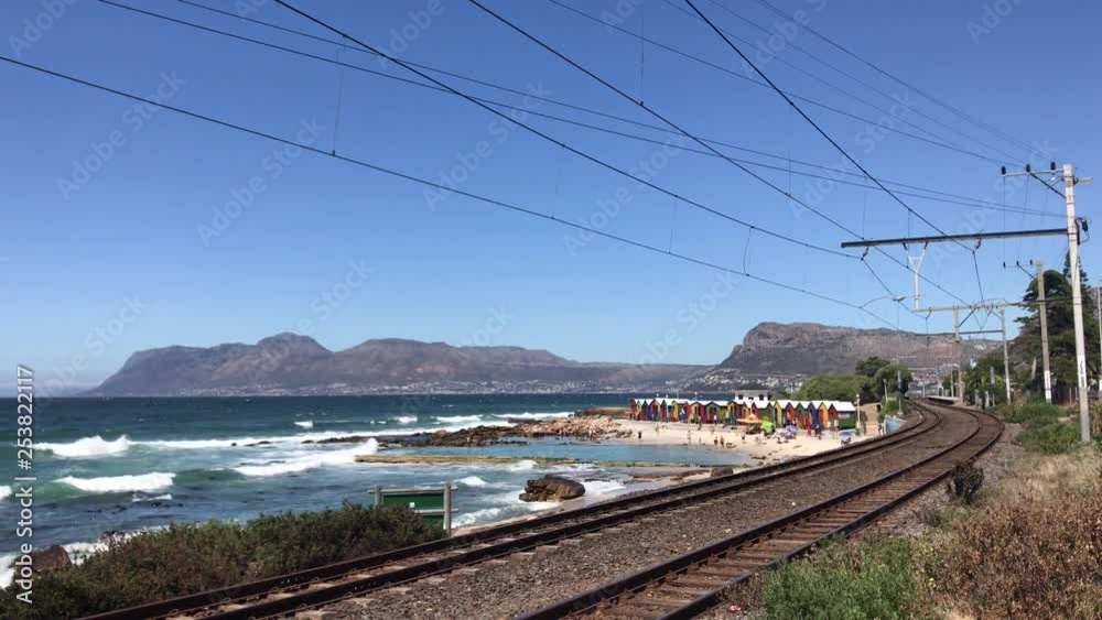 St James beach tidal pool on the False Bay side of the peninsula with colorful changing rooms on the beach with it’s own St Jame railway station St James beach tidal pool on the False Bay side of the peninsula with colorful changing rooms on the beach with it’s own St Jame railway station