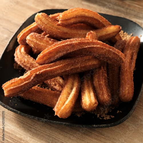 Cooking Churos Sugar. Photo of eating sweet donuts
