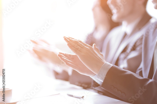close up. business team applauding in a meeting