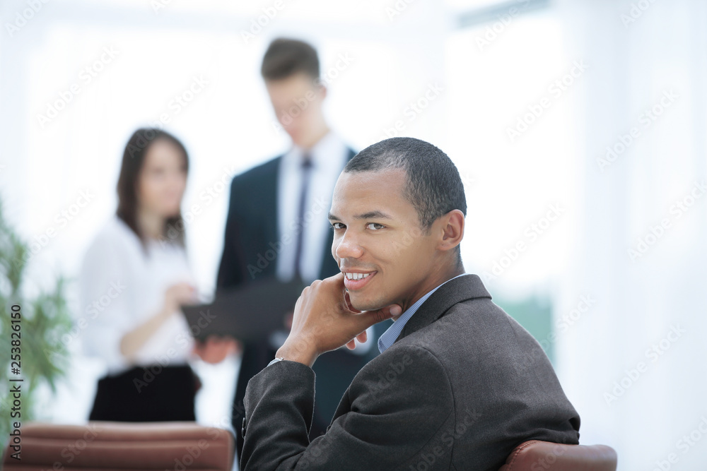 closeup .a successful businessman on blurred background closeup .a successful businessman on blurred background