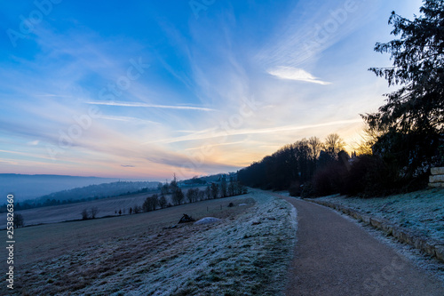 Frosty cold winter morning walking on a trail