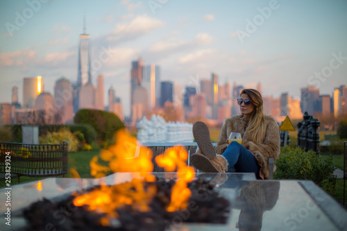 views of manhattan having a drink under fire