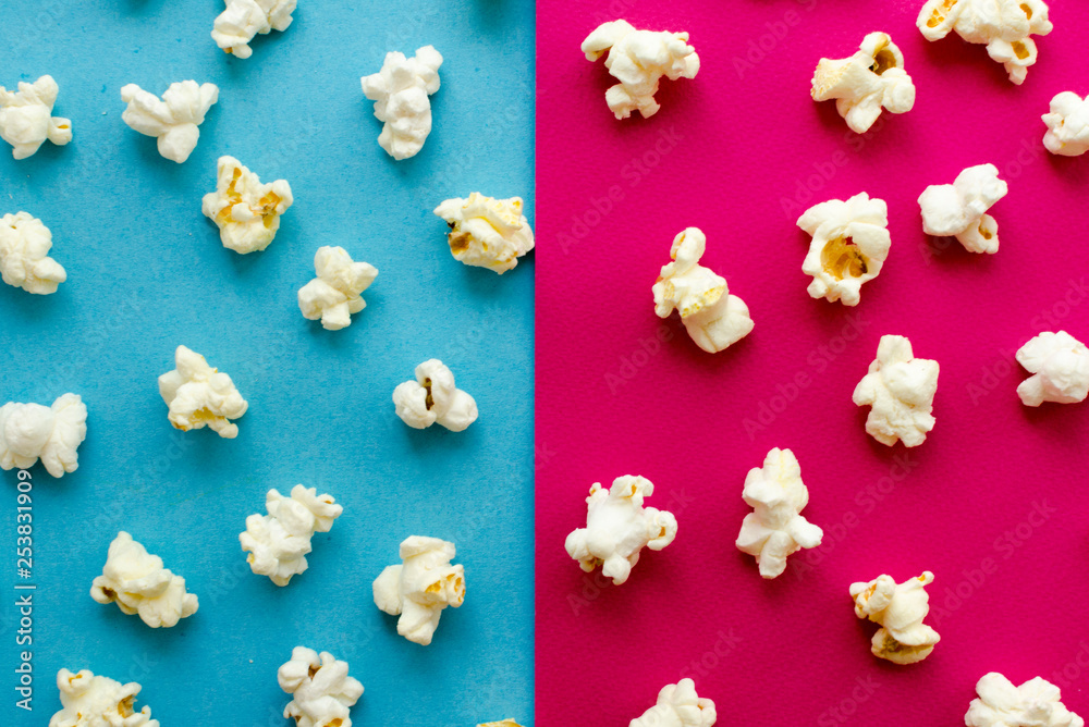 popcorn on pink and blue background popcorn on pink and blue background
