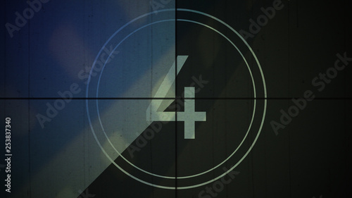 Film Vintage countdown number 4. Movie film strip with countdown number on grunge background. 2D animation old vintage film countdown retro down counter for movie start or presentation. photo