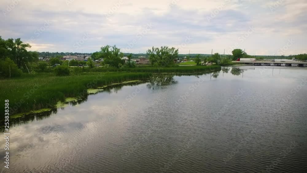 Aerial view of a large river in a swampy countryside. Aerial view of a large river in a swampy countryside.