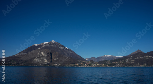 Snow capped peak overlooking lake como