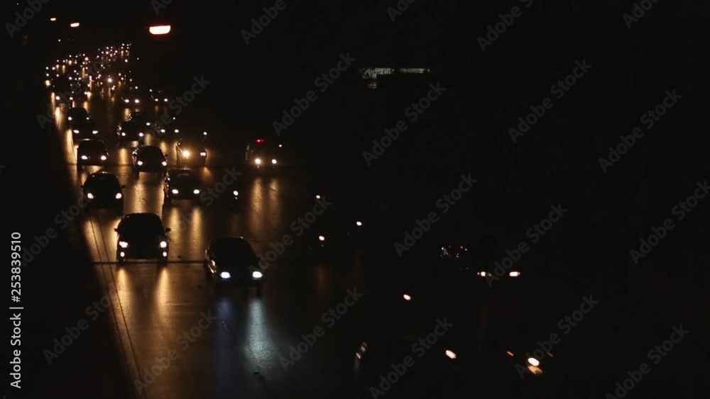 Times laps of Night traffic on the bridge, Beautiful yellow beams on the bridge by Cars and bikes