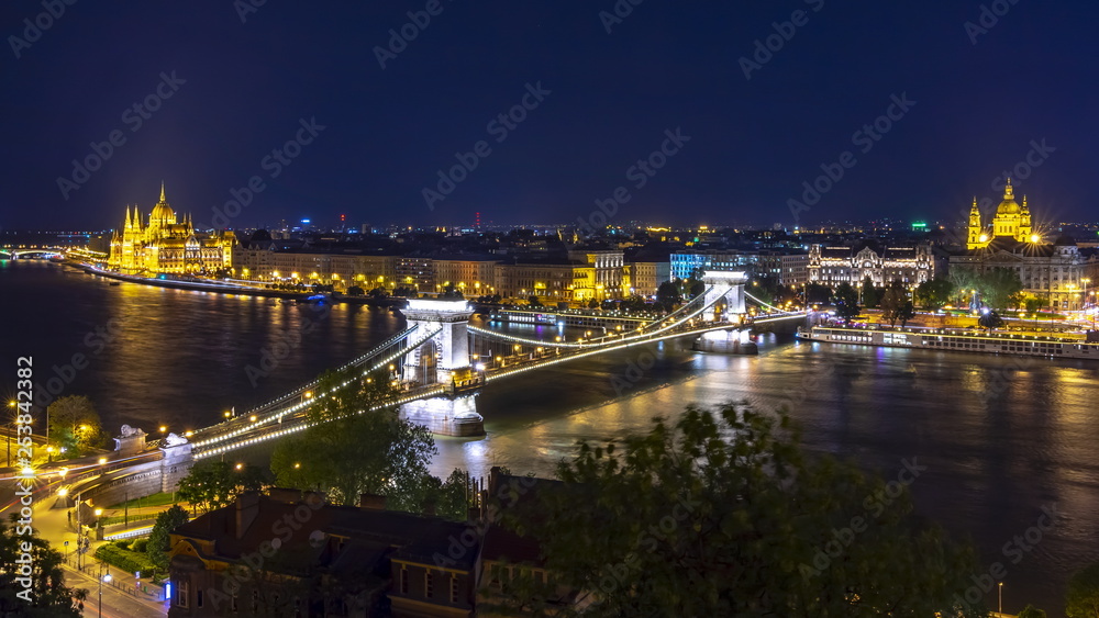 Budapest cityscape with St. Stephen's Basilica, Chain bridge and Hungarian parliament at night, Hungary