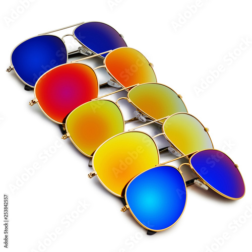 Colorful aviators sunglasses with colorful lenses on white background