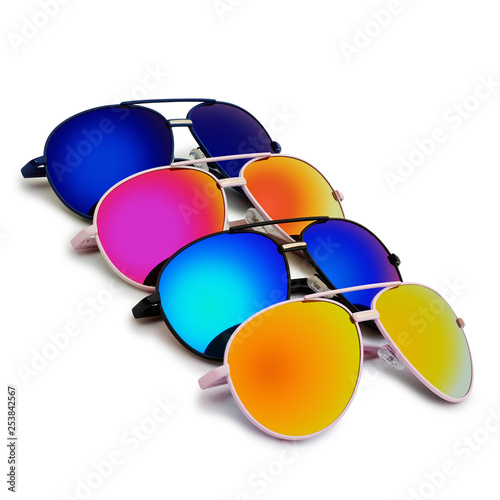 4 aviators sunglasses with colorful lenses on white background