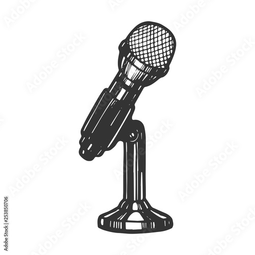 Microphone device sketch engraving vector illustration. Scratch board style imitation. Hand drawn image.