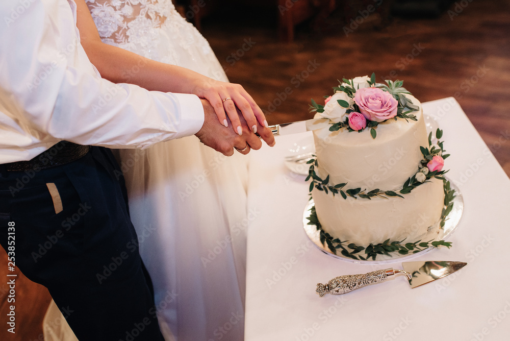 wedding cake at the wedding of the newlyweds wedding cake at the wedding of the newlyweds