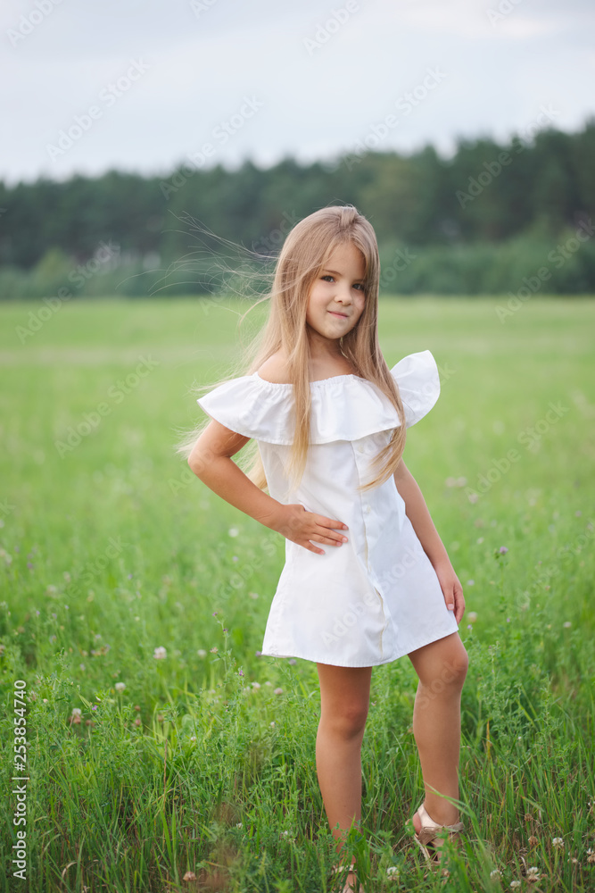 happy little girl with long hair happy little girl with long hair
