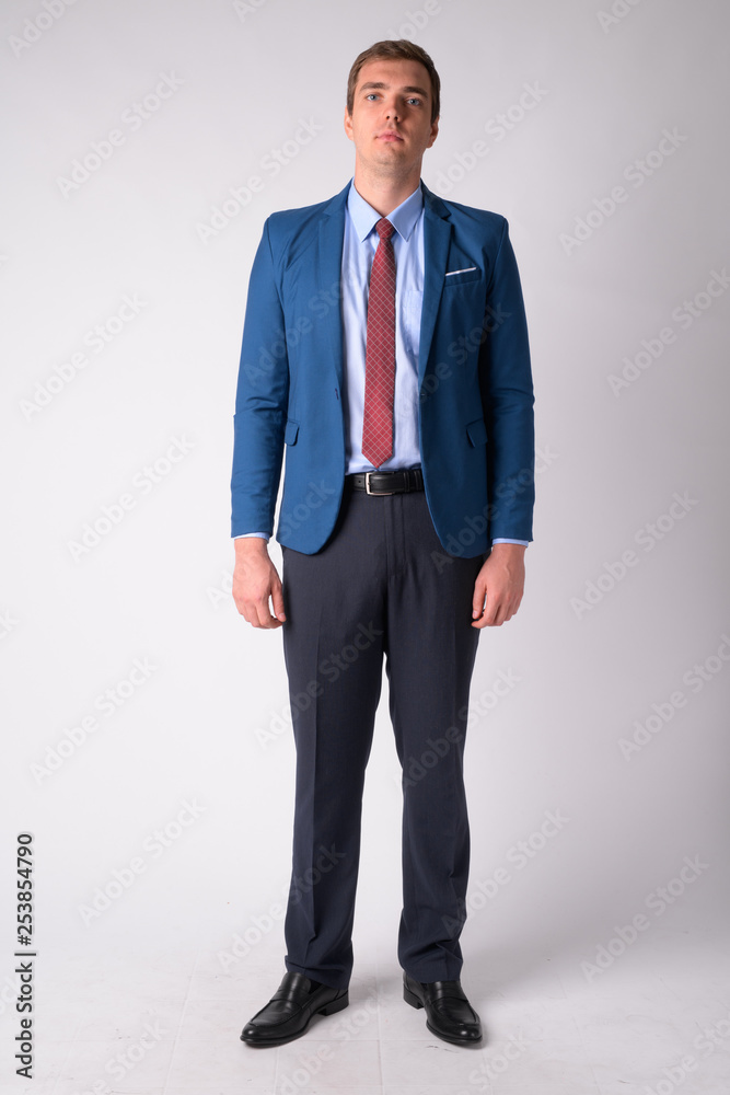 Full body shot of businessman wearing suit