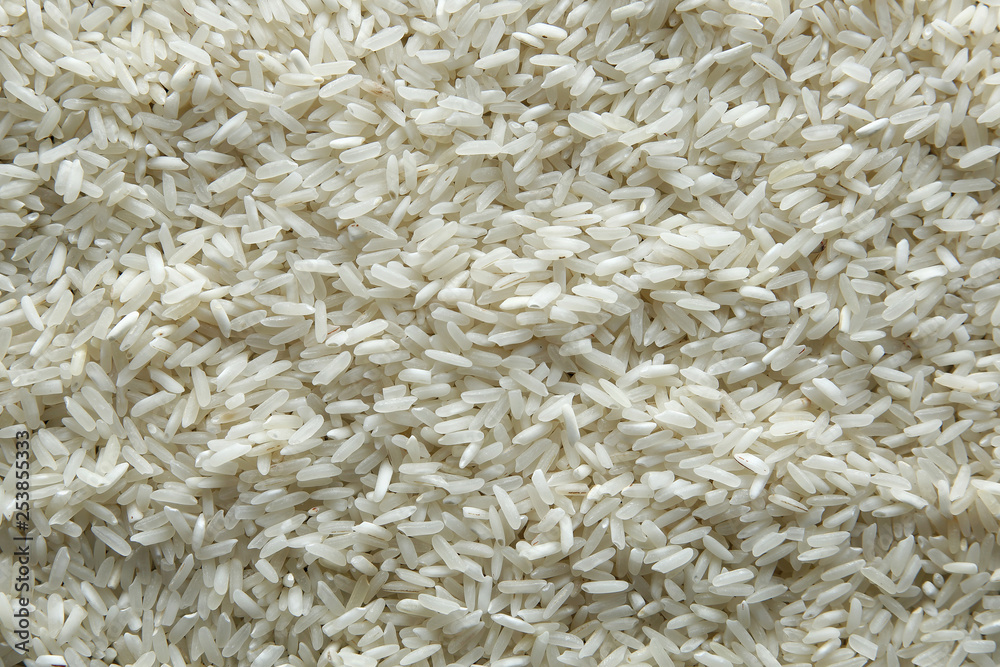 background of rice. Rice texture. Rice grains closeup. Top view background of rice. Rice texture. Rice grains closeup. Top view
