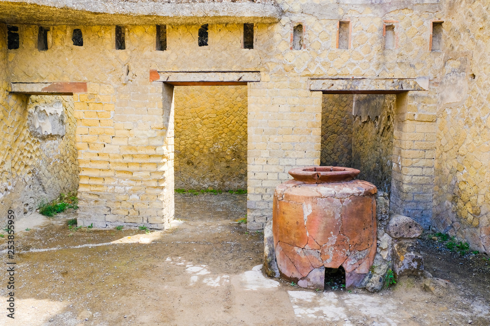 Herculaneum, ancient Roman town. wine warhouse with big amphora, Ercolano, Italy Herculaneum, ancient Roman town. wine warhouse with big amphora, Ercolano, Italy