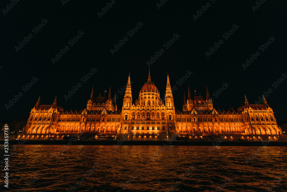 Budapest Parliament in Hungary at night. ripple on the river wat