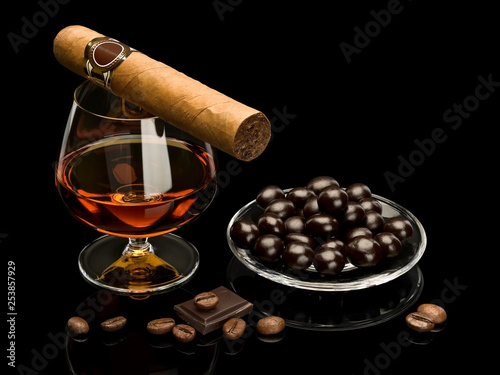 Cognac, cigar and chocolate covered coffee beans