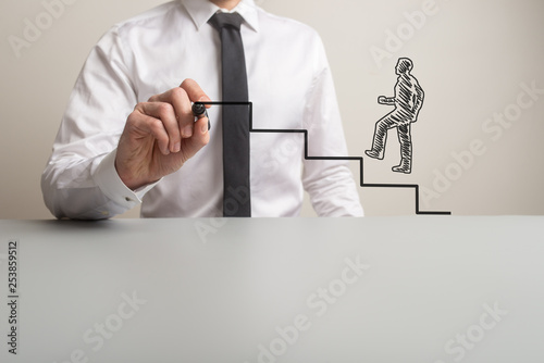 Canvas-taulu Business executive drawing steps for a handdrawn businessman to climb