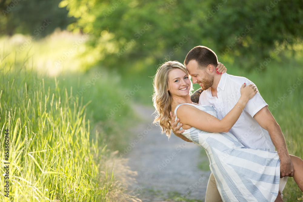 Beautiful young couple happily engaged