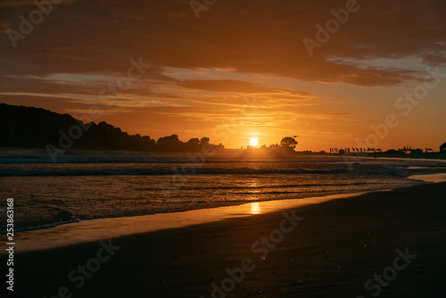 Golden sunrise over beach © Brian Scantlebury