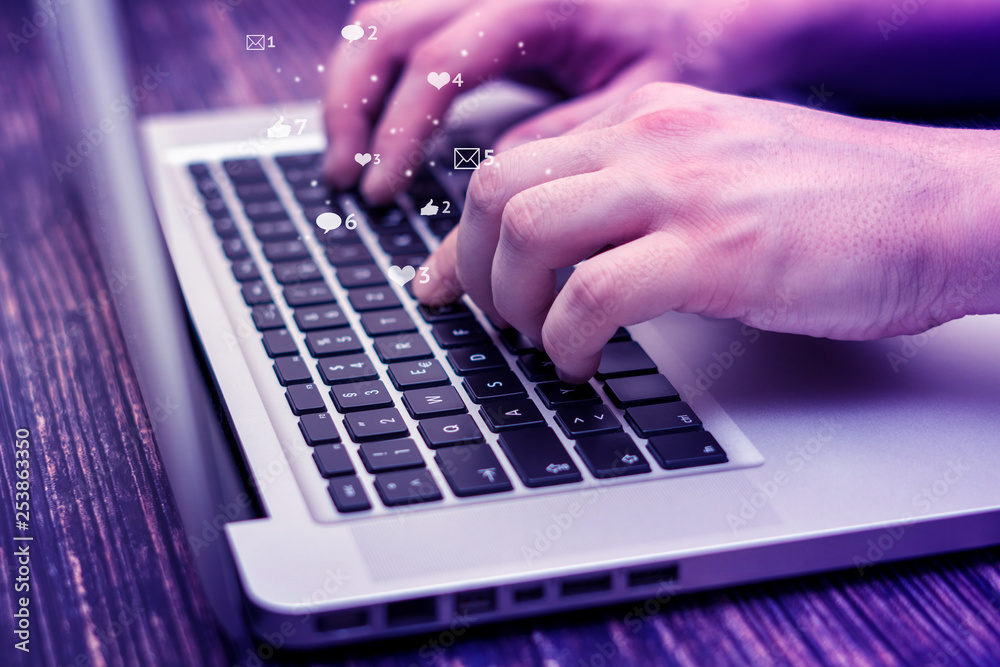 Man is using laptop with black keys, Social media and social networking. Marketing or business concept Man is using laptop with black keys, Social media and social networking. Marketing or business concept
