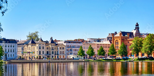 Old town of Schwerin with historic houses on Pfaffenteich lake. Mecklenburg-Vorpommern, Germany photo
