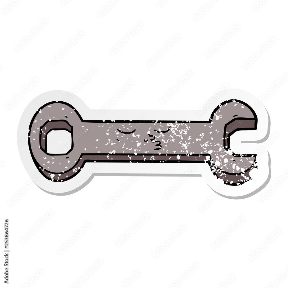 distressed sticker of a cartoon spanner distressed sticker of a cartoon spanner