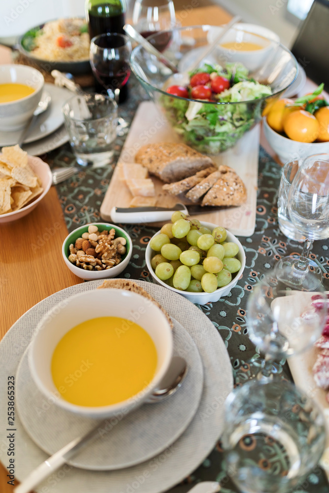 Laid table for a light summer lunch with friends Laid table for a light summer lunch with friends