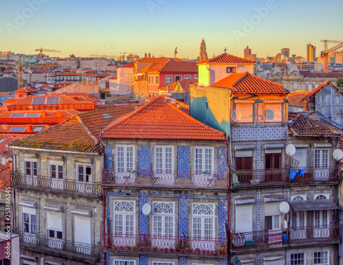 Traditional historic facade of buildings in Porto decorated with azulejos in Porto, Portugal