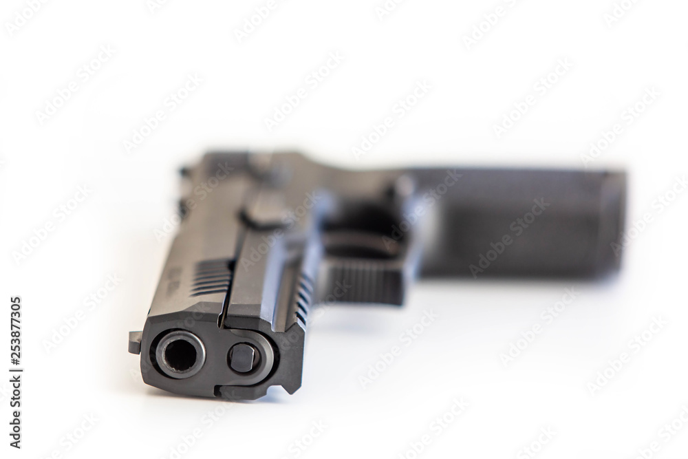Modern handgun white background isolated close up Modern handgun white background isolated close up