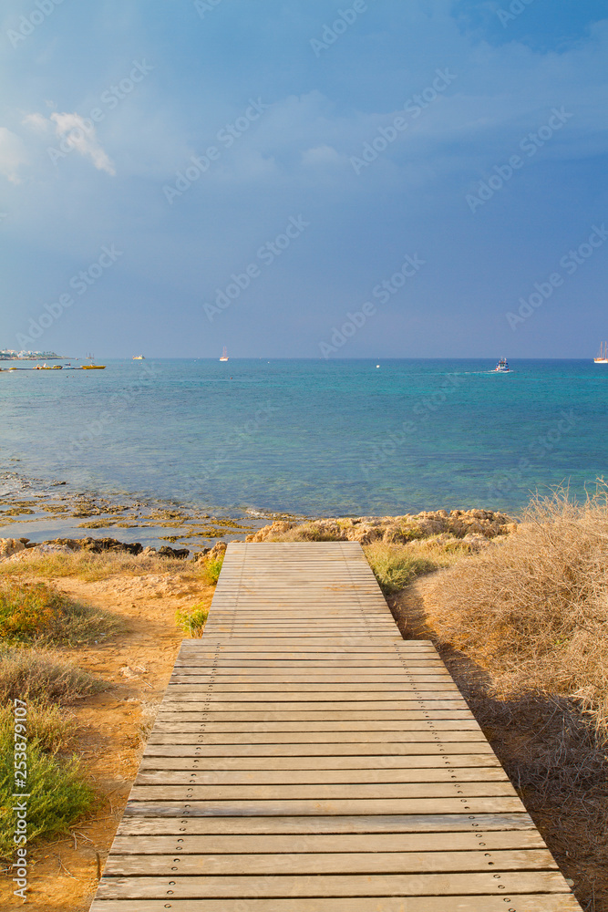 Wooden deck or walkway to sea. Sea beach relax, outdoor travel. Copy space background - Image