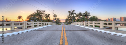 Фотография Bridge roadway over a riverway that leads to the ocean on Marco Island