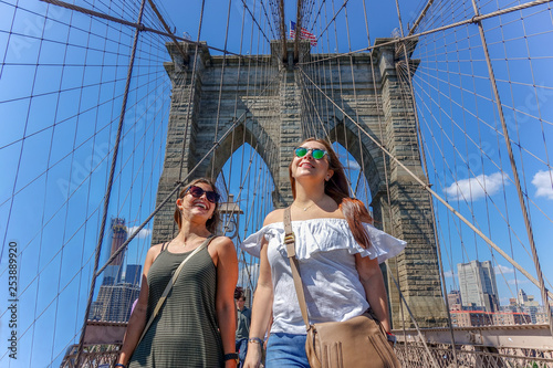 Girls having fun at New York, Brooklyn Bridge