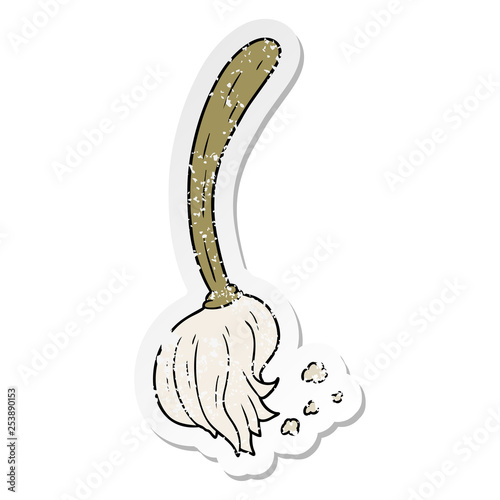 distressed sticker of a cartoon mop