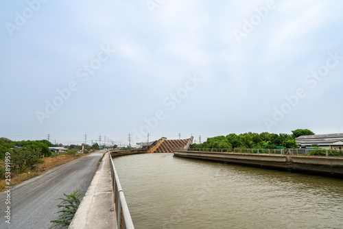 Wallpaper Mural aqueduct water bridge across road for drainage water to sea at Suvarnabhumi thailand (building for prevent flood airport) with blue sky Torontodigital.ca