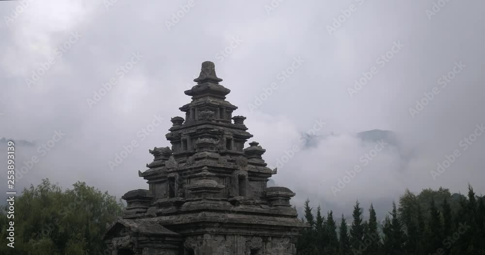 Slow tilting shot across old Hindu temple complex on Dieng Plateau, wonosobo Slow tilting shot across old Hindu temple complex on Dieng Plateau, wonosobo