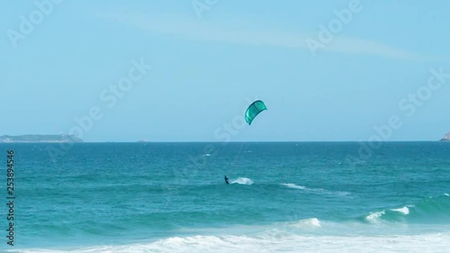 Man kite surfing in Florianpolis, Brazil.