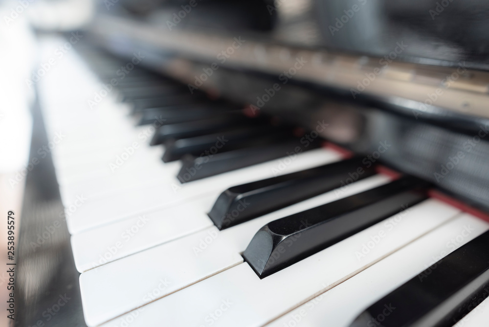 Piano keyboard background with selective focus Piano keyboard background with selective focus