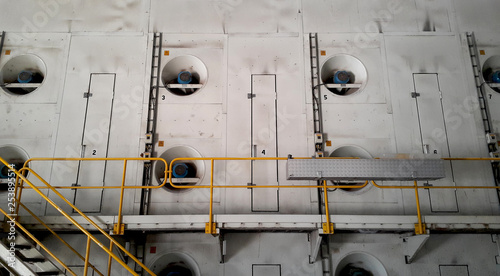 Walk way with yellow handrail in side of Paper machine