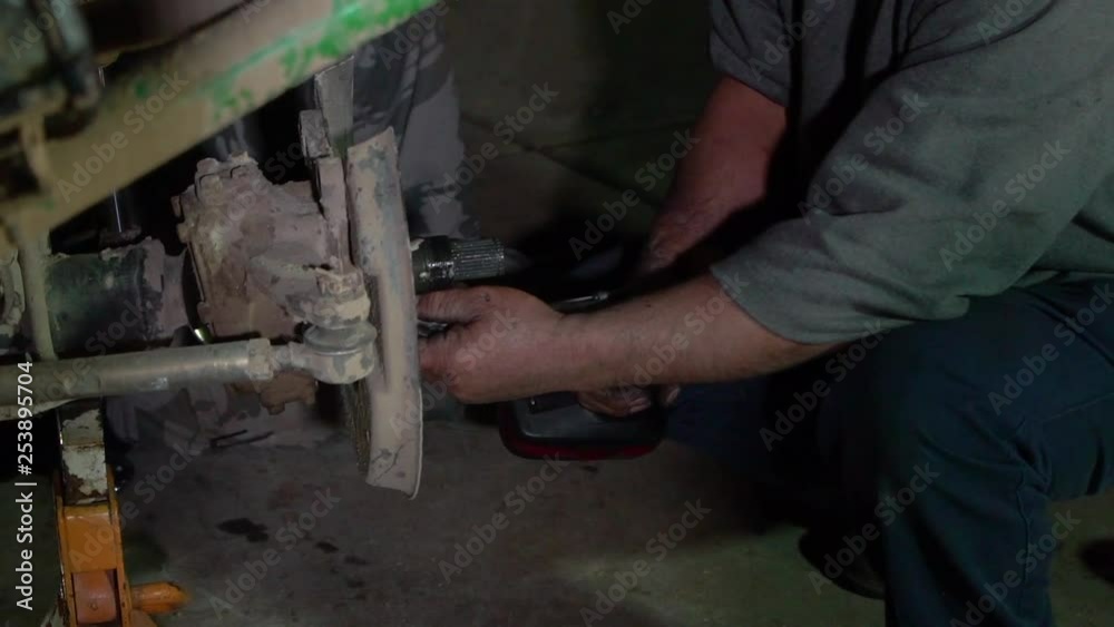 Removing parts from front axle housing Removing parts from front axle housing
