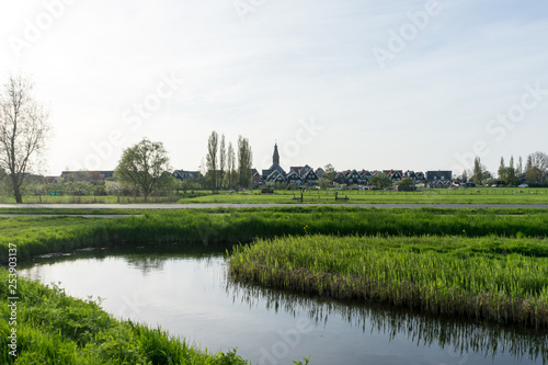 Netherlands,Wetlands,Maarken, a large body of water surrounded by green grass and trees