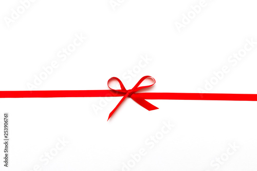 red ribbon or rope tied in bow isolated on white background