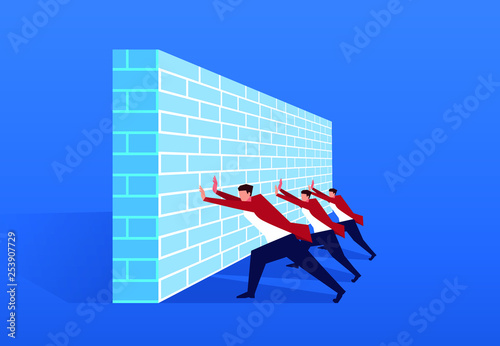 Businessman working hard together trying to push the wall