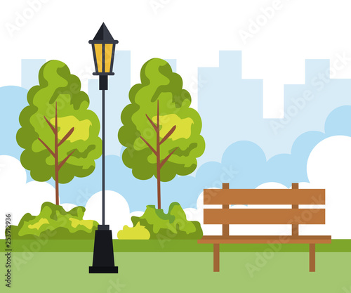city park with trees and chair with lamp
