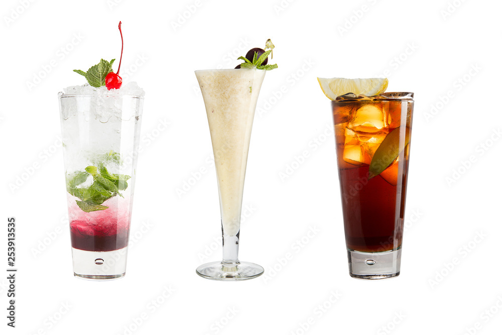 A variety of alcoholic drinks, beverages and cocktails on a white background. Three different refreshing drinks. A variety of alcoholic drinks, beverages and cocktails on a white background. Three different refreshing drinks.