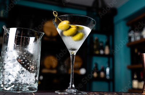 martini cocktail with olives