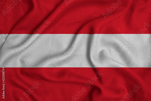 Flag of the Austria from the factory knitted fabric. Backgrounds and Textures