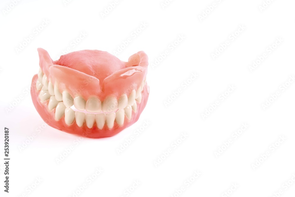 Artificial teeth on a white background Artificial teeth on a white background