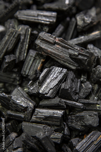 Black tourmaline natural shape druzy background © marbenzu